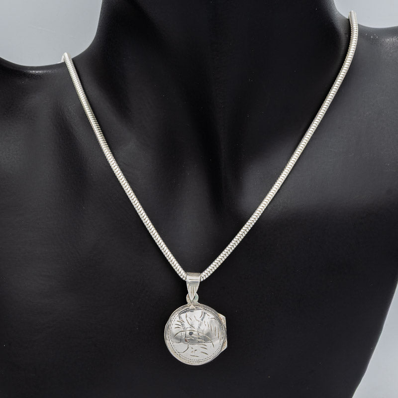 Sterling silver round engraved locket