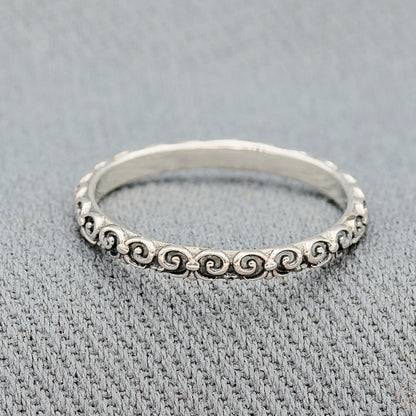 Sterling silver ring with scroll patterns