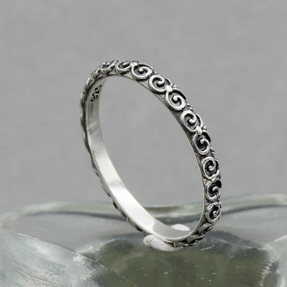 Sterling silver ring with scroll patterns
