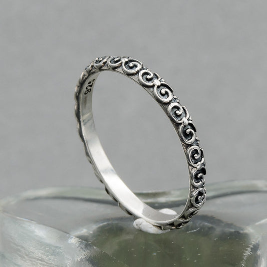 Sterling silver ring with scroll patterns