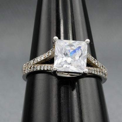 Sterling silver ring with a Square cubic on a split shank band