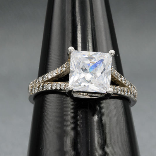Sterling silver ring with a Square cubic on a split shank band