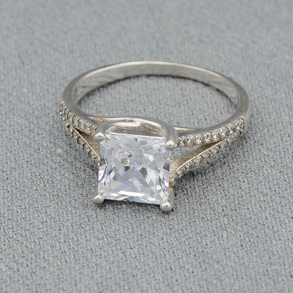 Sterling silver ring with a Square cubic on a split shank band