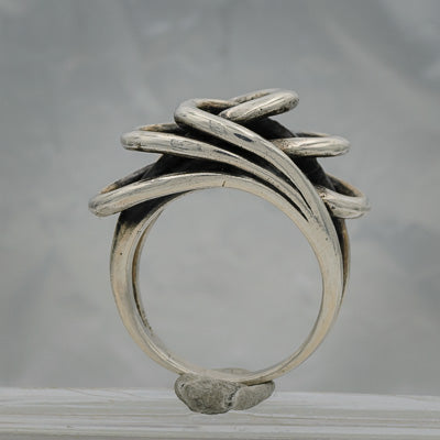 Intertwined wired silver ring