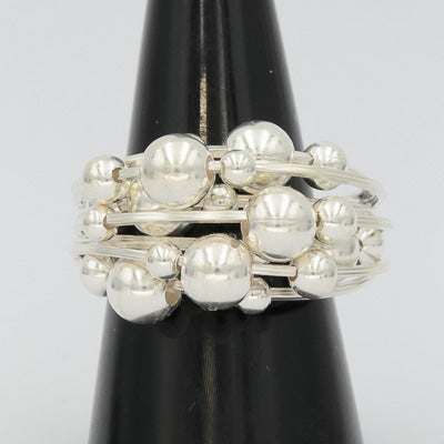 Sterling silver multiple wired ring with balls.