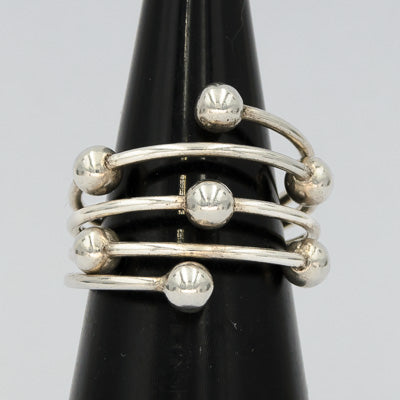 Sterling silver wrapped around ring with 7 balls