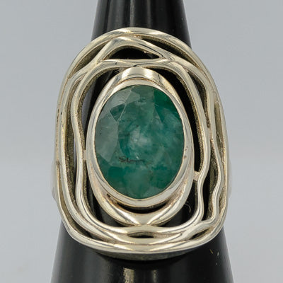 Rough green sapphire set in silver ring