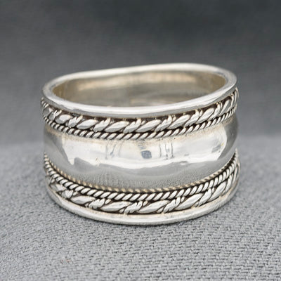 Sterling silver band with a zig zag pattern