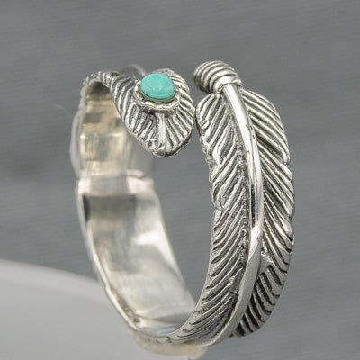 Sterling silver feather ring with a turquois