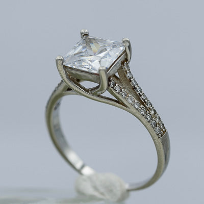 Sterling silver ring with a Square cubic on a split shank band