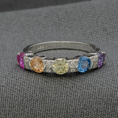 Multi color cubic ring with white cubics in between