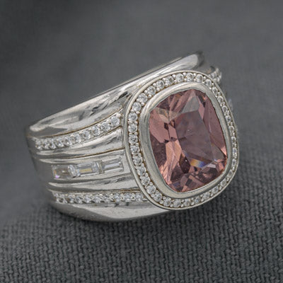 Sterling silver split shank ring with large cubic and sparkling cluster detail.
