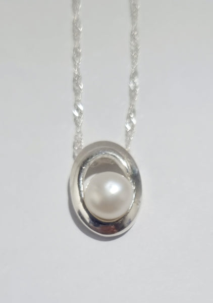 silver oval with freshwater pearl