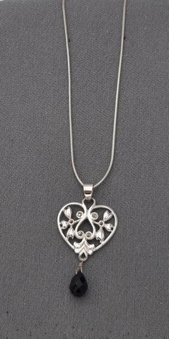 Onyx heart pendant on a chain