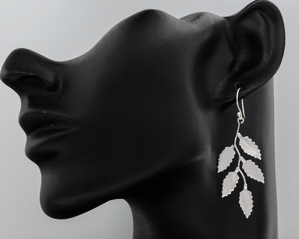 Leaf in brushed silver earrings