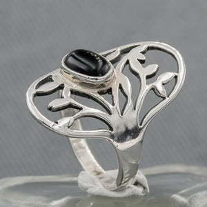 Branch with onyx ring
