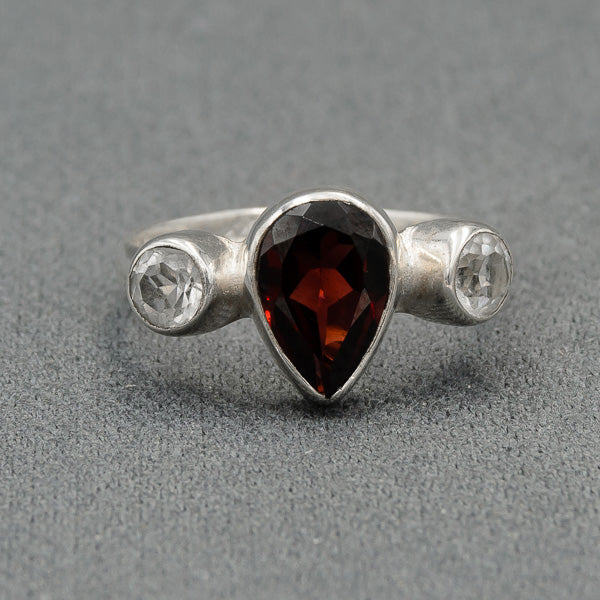 Garnet and crystal ring